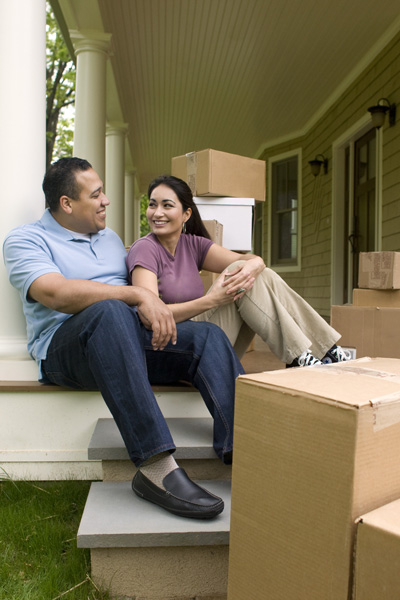 Couple on Steps with Boxes